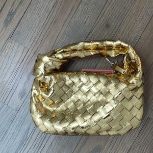 NWT Gold knot purse